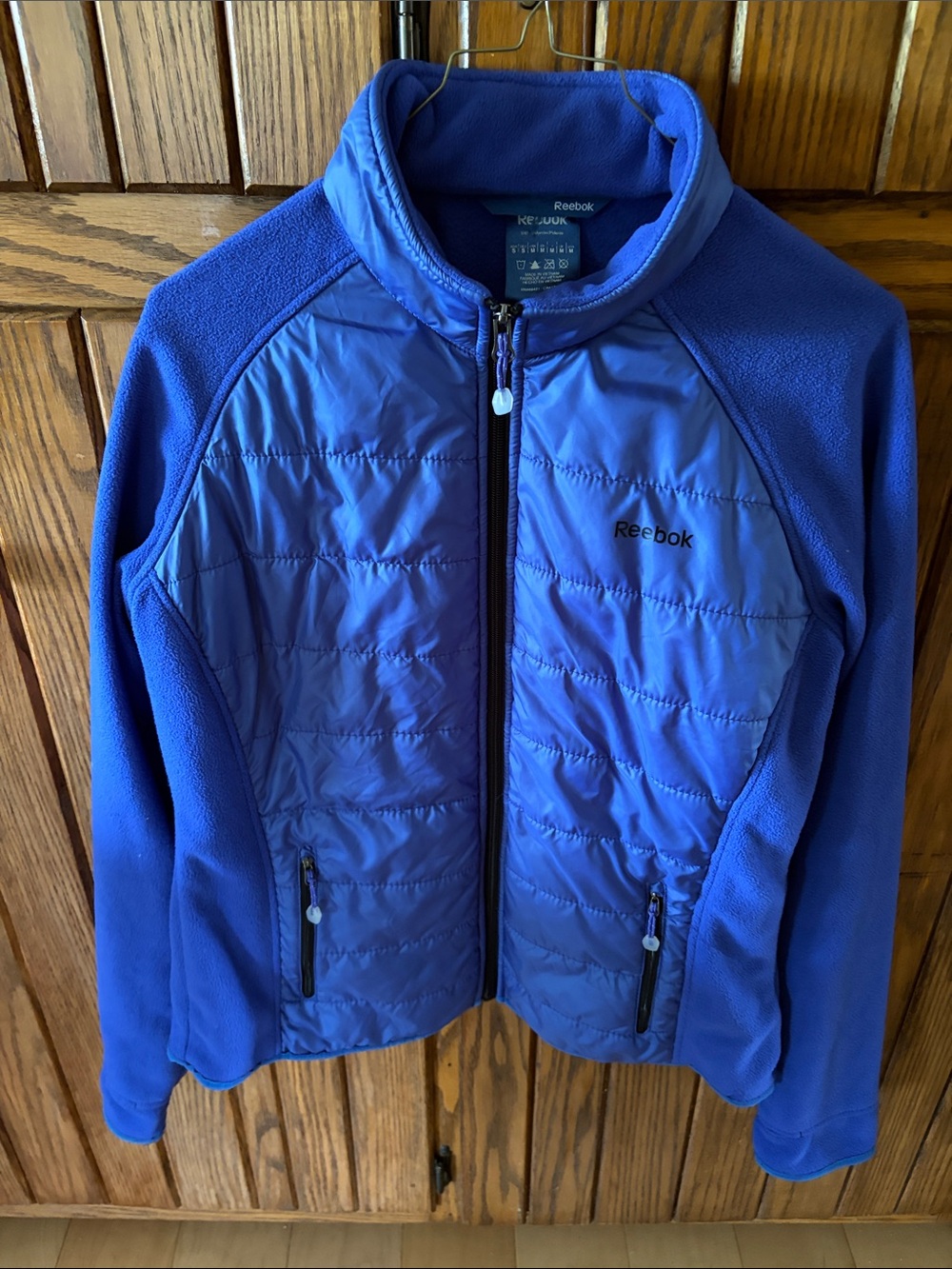 Reebok blue fleece with quilted front
Women’s size Small